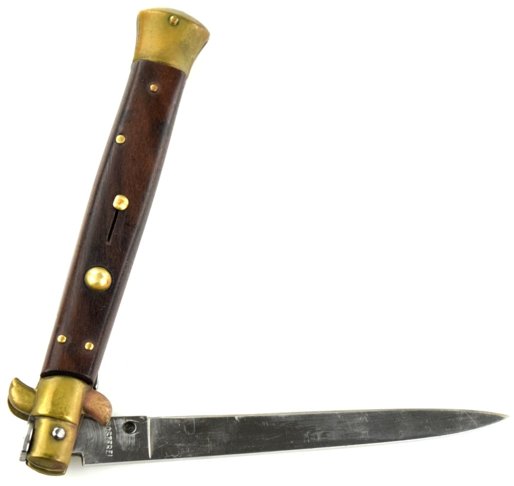 Vintage Rostfrei Italian 1970's Rosewood Stiletto Switchblade Knife: Vintage 1970's Italian stiletto. Standard flat ground blade is stamped " Rostfrei" on the front tang. Genuine Rosewood scales. Blade fires strong. Total length (closed): 6", Blade length : 5". ~ . Det