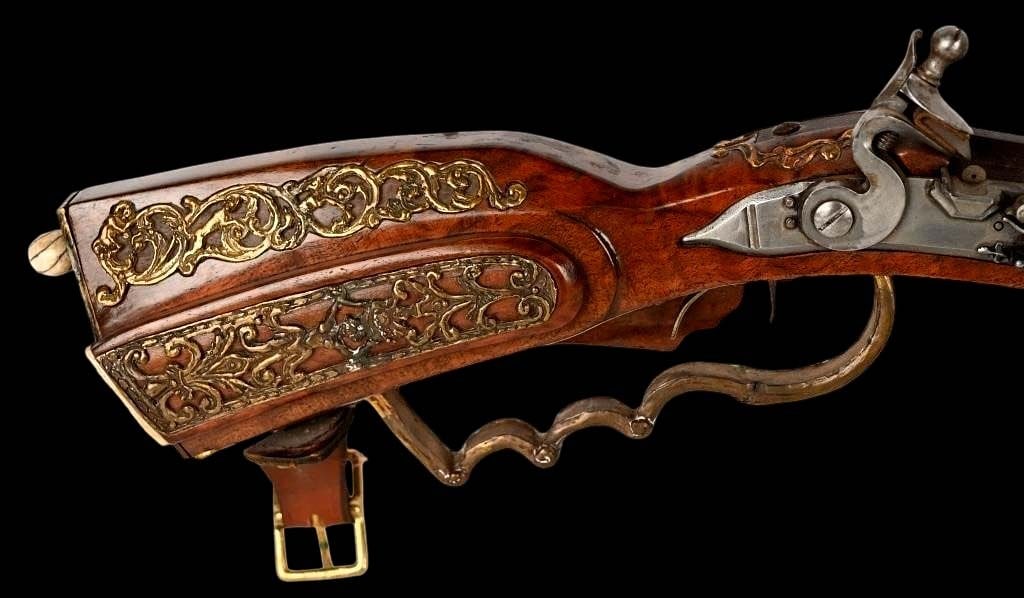 Beautiful Swedish Cheekstock Flintlock Jaeger Hunting Rifle of Jonas Schertiger the Younger style,: Beautiful Swedish Cheekstock Flintlock Jaeger Hunting Rifle of Jonas Schertiger the Younger style, with Fancy Carved Wood Stock & Exquisite Brass & Bone Mounts. 40 caliber. 30" octagonal barrel length
