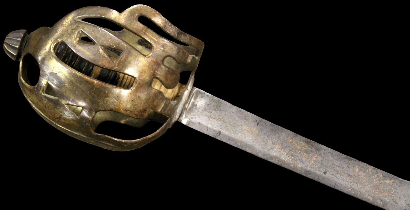 American Revolution Period Scottish Full Basket-Hilt Sword with Pierced Brass Guard & Gilt-Decorated: A handsome Scottish basket-hilt sword featuring a pierced brass (or gilt brass) full basket guard of classic Highland form, enclosing a corded grip (dark leather and lighter cord wrap visible through