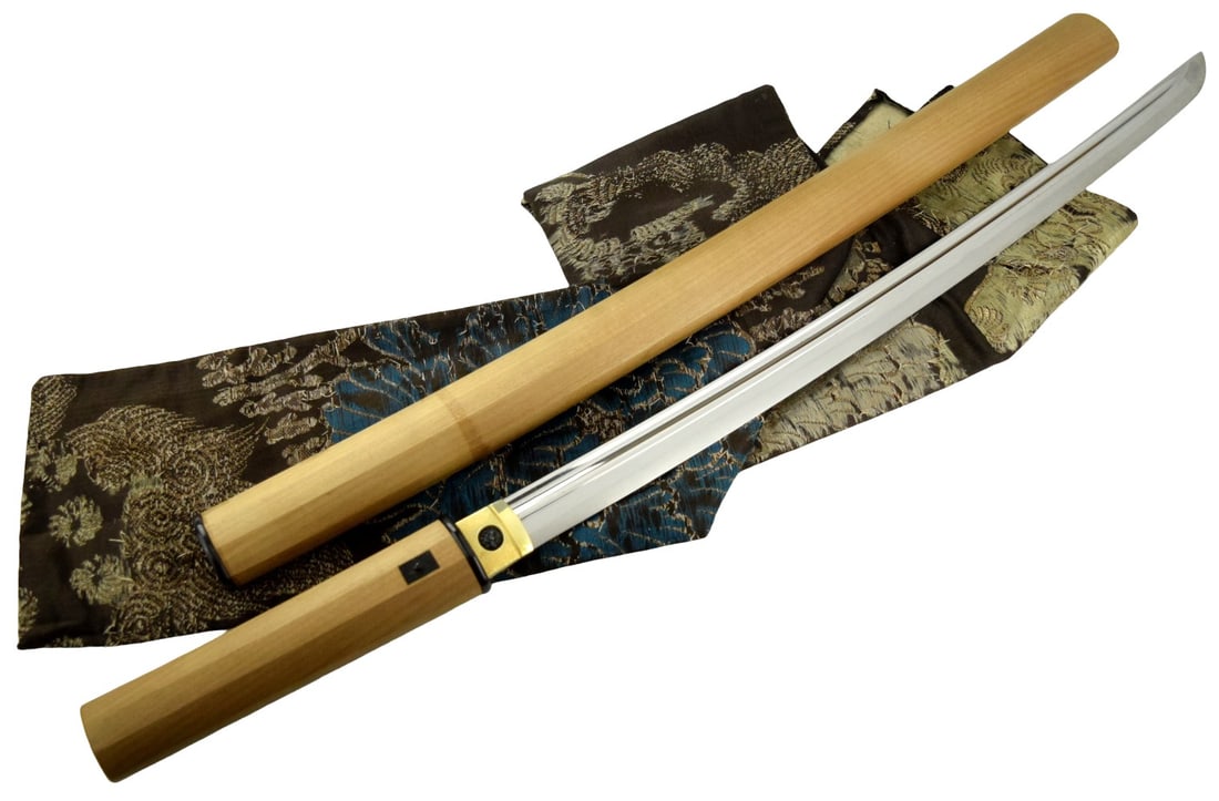 17th very attractive Shinto Wakizashi in shirasaya with Kinpunmei / gold signature to: Echizen no: 17th very attractive Shinto Wakizashi in shirasaya with Kinpunmei / gold signature to: Echizen no kami Sukehiro , cutting edge 20-1/8". In very clean full-polish & flawless. Complex well carved horimo