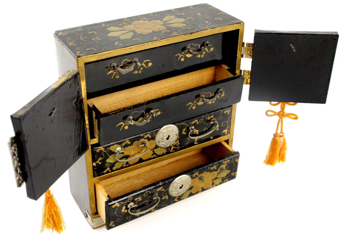 Antique Japanese Lacquer Small Chest of Drawers Tansu Jewelry Box: Antique Meiji period miniature Japanese Tansu lacquer chest, late 19 th Century. Four drawers with silver handles and silver fittings. Size: H: 6", L: 5 3/8", W: 2". Detailed condition reports are not