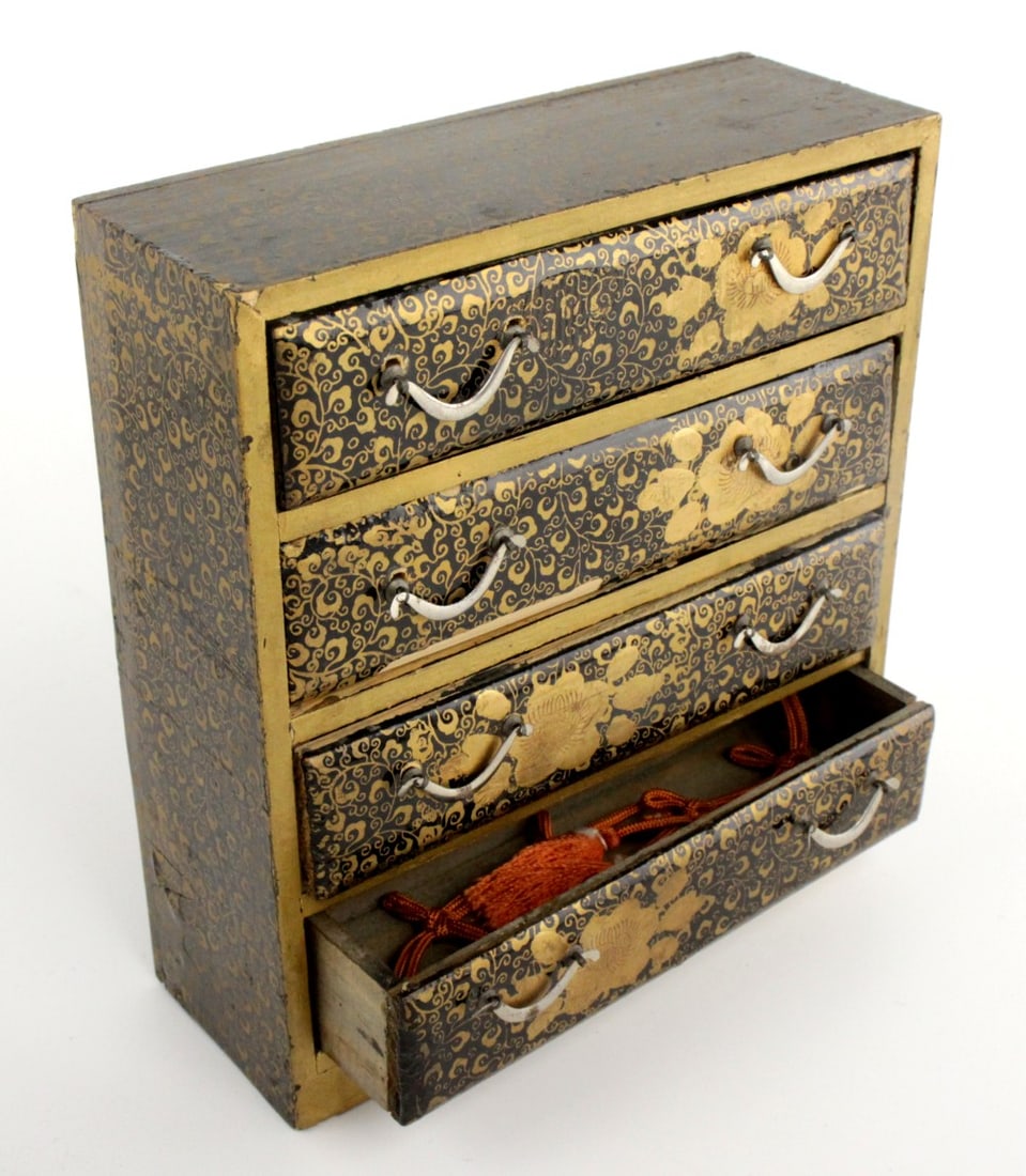 Antique Japanese Lacquer Small Chest of Drawers Tansu Jewelry Box: Antique Meiji period miniature Japanese Tansu lacquer chest, late 19 th Century. Four drawers with silver handles. Size: H: 6", L: 5 3/8", W: 2". Detailed condition reports are not included in this ca