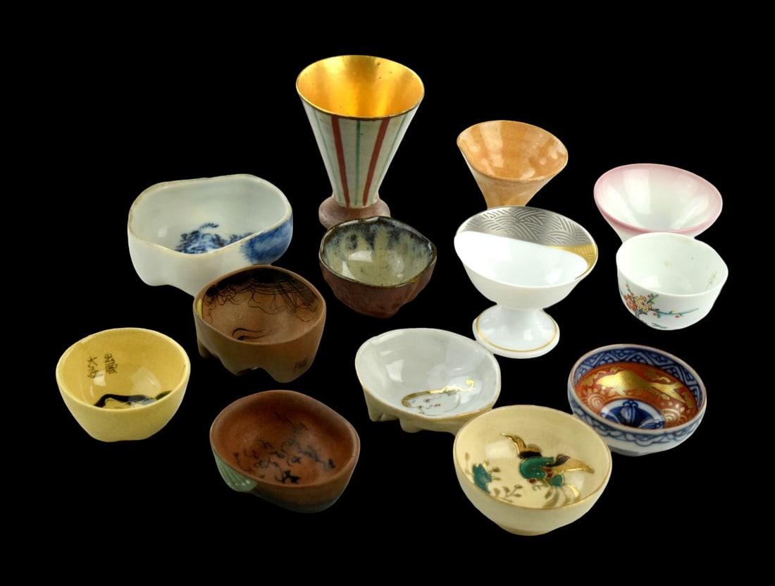 Lot of various antique Japanese sake shot glasses: Lot of various antique Japanese sake shot glasses Size: 3" (tallest item in the lot) Detailed condition reports are not included in this catalog. For additional information, including condition report