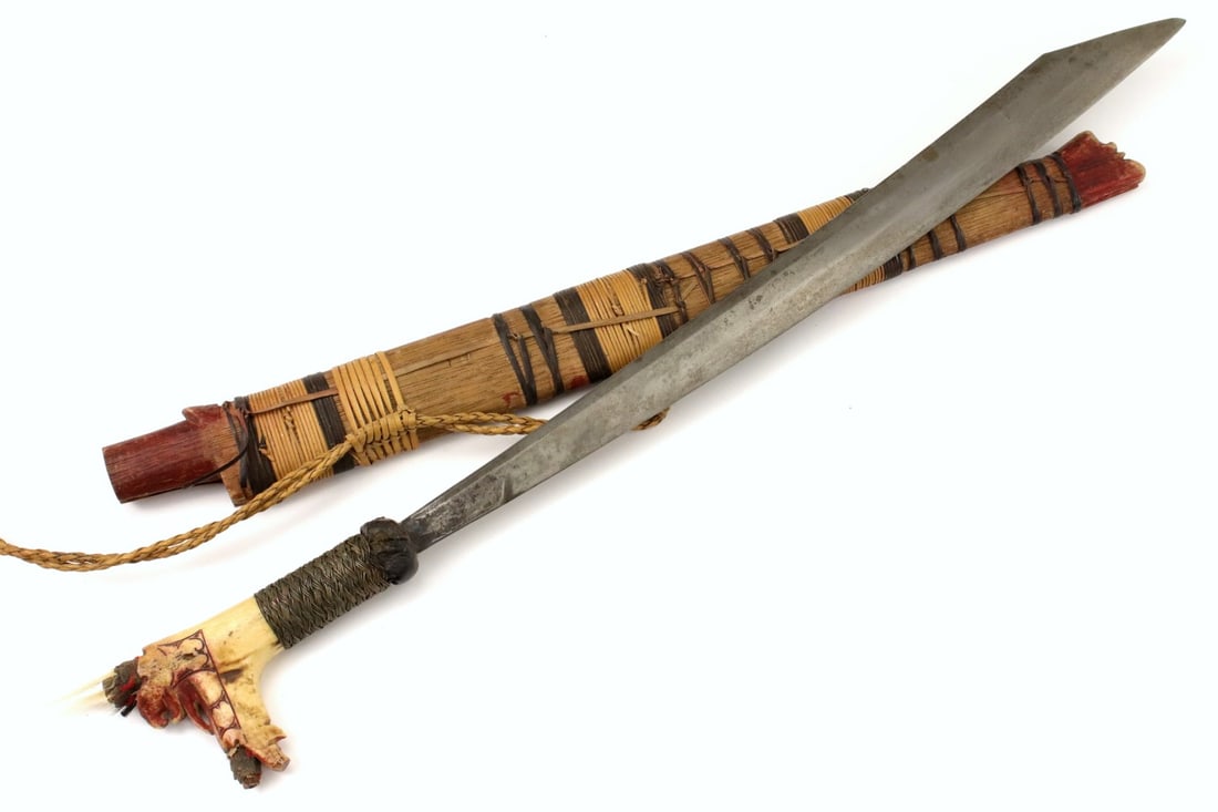 Antique Indonesian Tribal MANDAU Sword ~ Used by Borneo DAYAK Tribe Headhunters ~ Carved Bone Grip.: Antique Indonesian Tribal MANDAU Sword ~ Used by Borneo DAYAK Tribe Headhunters ~ Carved Bone Grip. Total length (inside scabbard if present) : 26 1/2 ", Blade length :19". Detailed condition reports