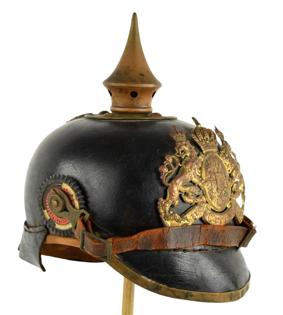 Imperial German WWI Bavarian M1895 Pickelhaube infantry helmet: Imperial German WWI Bavarian M1895 Pickelhaube infantry helmet. The helmet features a black boiled leather body with brass fittings, including the distinct Bavarian coat of arms on the front.It includ