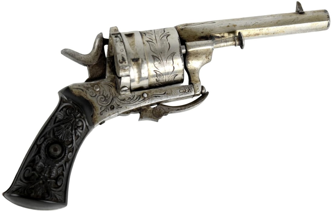 Engraved Belgian Pinfire 7mm Revolver c.1800's: Unusual highly embellished and factory engraved 7mm pinfire revolver, circa 1860-1880. Size: 7". For additional images please visit sofedesignauctions.com The pinfire system of i