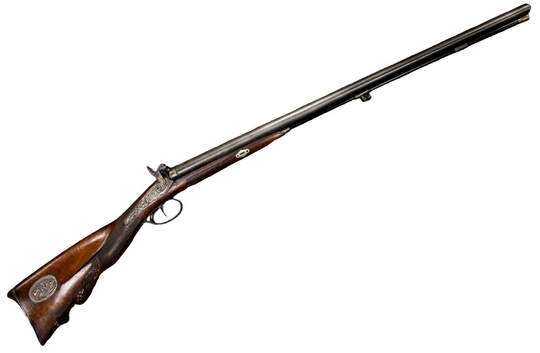 Fine Mid-19th Century Spanish Eibar Damascus Barrel Percussion Sporting Rifle with Gold Damascened: A fine mid-19th century Spanish sporting rifle, likely produced in Eibar, featuring an attractive Damascus twist barrel and finely engraved percussion lock enriched with gold damascened (tausia) decor