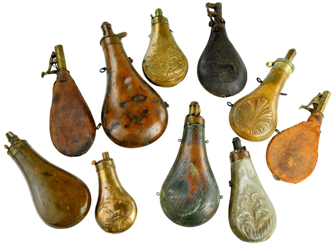 Lot of Ten Antique Assorted Powder Flasks: Lot of Ten Antique Assorted Powder Flasks. Largest: 10", Smallest : 5". ~ . For additional images please visit sofedesignauctions.com Detailed condition reports are not included in this