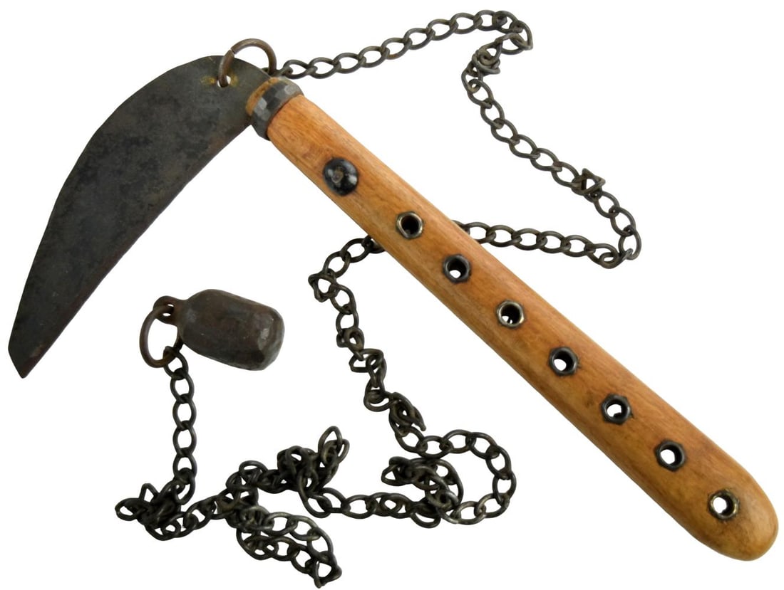 Antique Japanese Kusarigama (Chain-Linked Kama): Antique Japanese kusarigama, the iconic chain-and-sickle weapon associated with feudal Japan, dating from the late Edo to early Meiji period (19th century). The weapon consists of a forged iron kama (