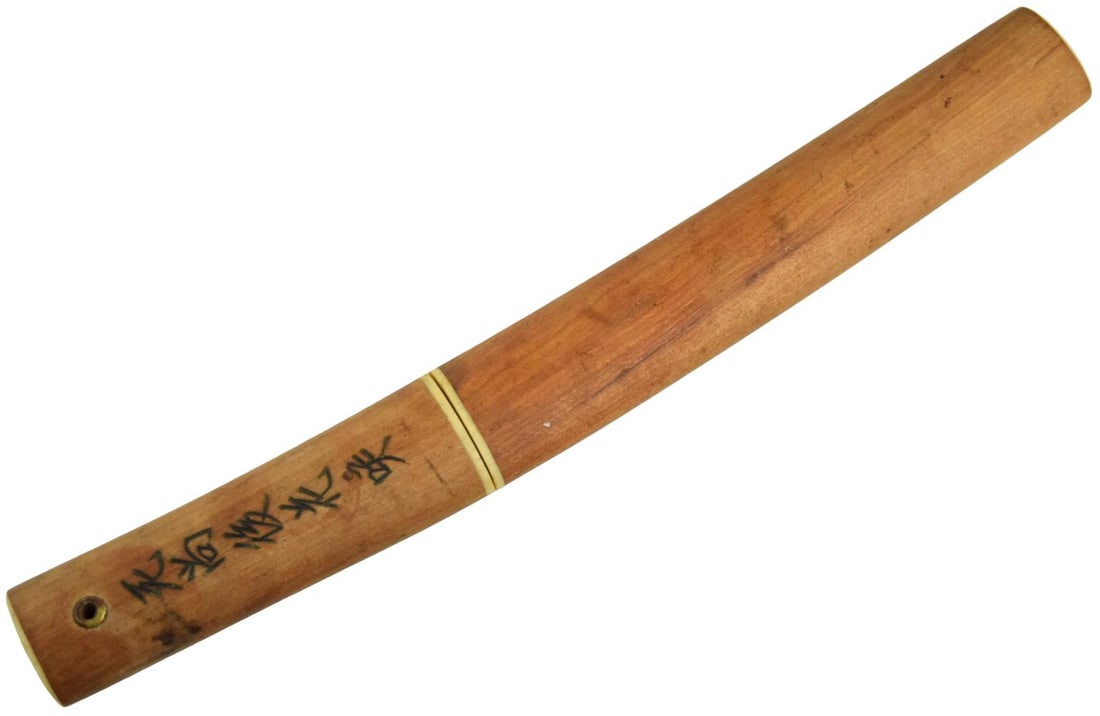 Japanese Tanto Knife in Signed Shirasaya: Japanese tanto knife housed in a plain wooden shirasaya-style scabbard and handle. The blade measures 6 1/2 inches, with an overall length of 12 inches in the scabbard. The blade has a curved tanto pr