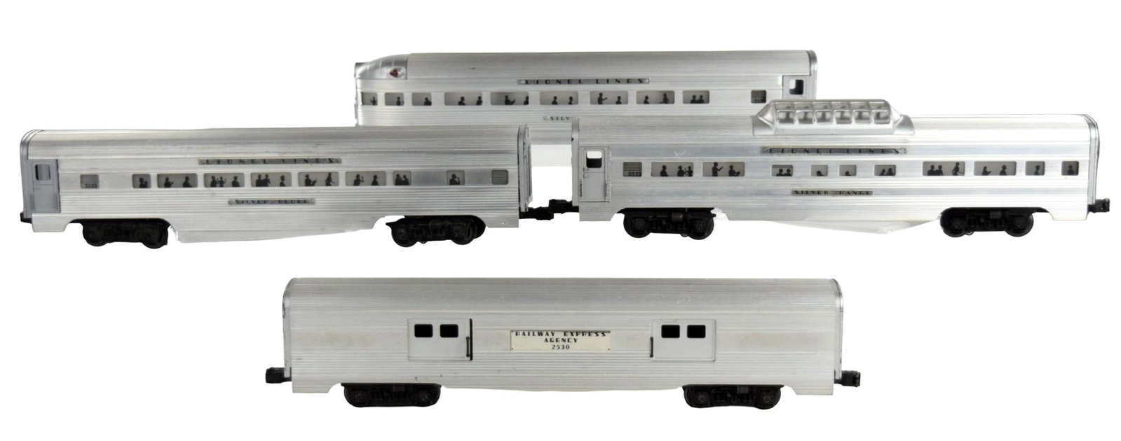 Lot 4 Postwar Lionel Lines O Gauge Cars: Lot of 4 Lionel Lines O gauge postwar cars. Railway Express Agency #2530, Silver Bluff # 2533, Silver Range #2532 and Silver Dawn #2531. Provenance: trains collector estate , Denver, Colorado. For add
