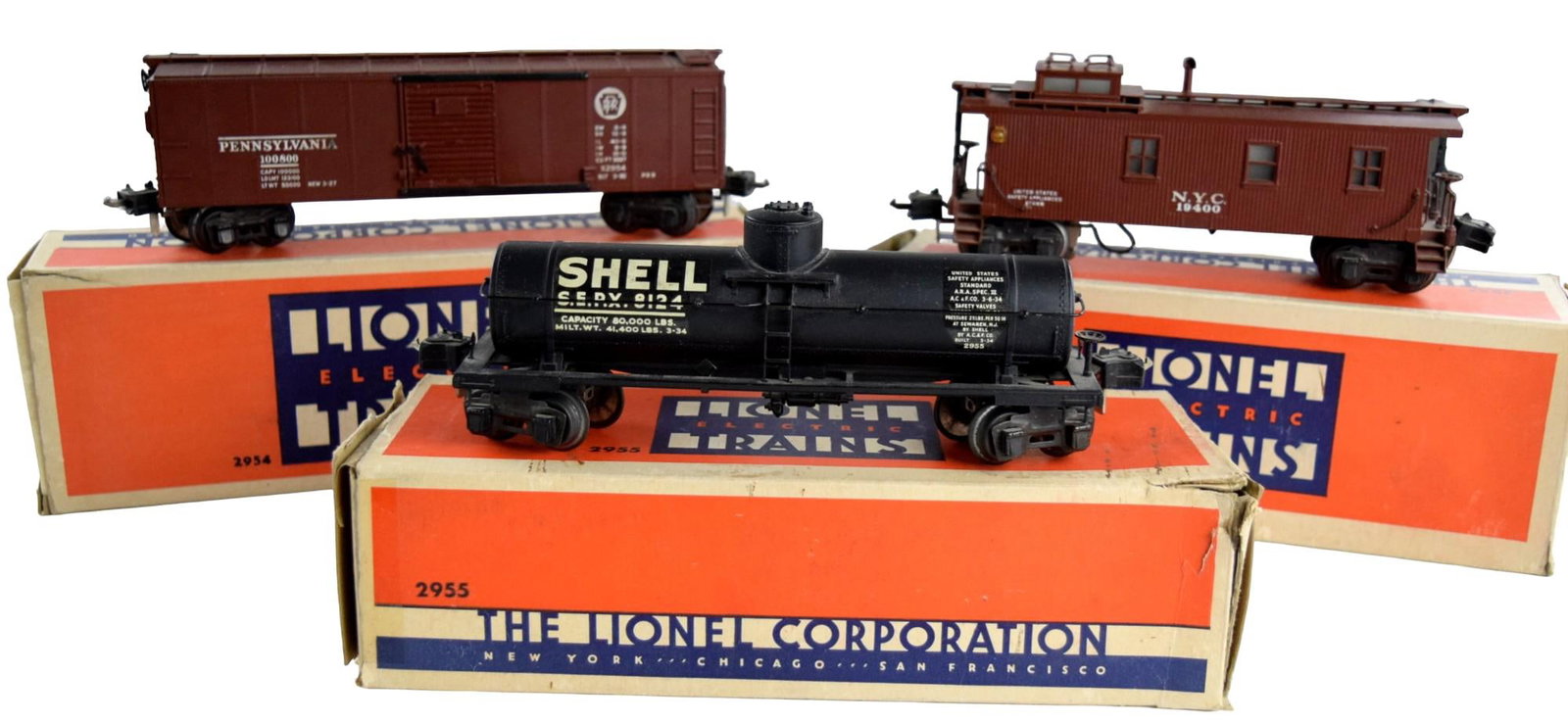 Prewar Lionel # 2954, 2955, 2957 Freight Cars Set: Wonderful Lionel prewar semi-scale set of Freight Cars from 1940-41.This features the No. 2954 PRR Boxcar, the No. 2955 Shell Tank Car, and the No. 2957 Caboose. This set includes all the Individual B