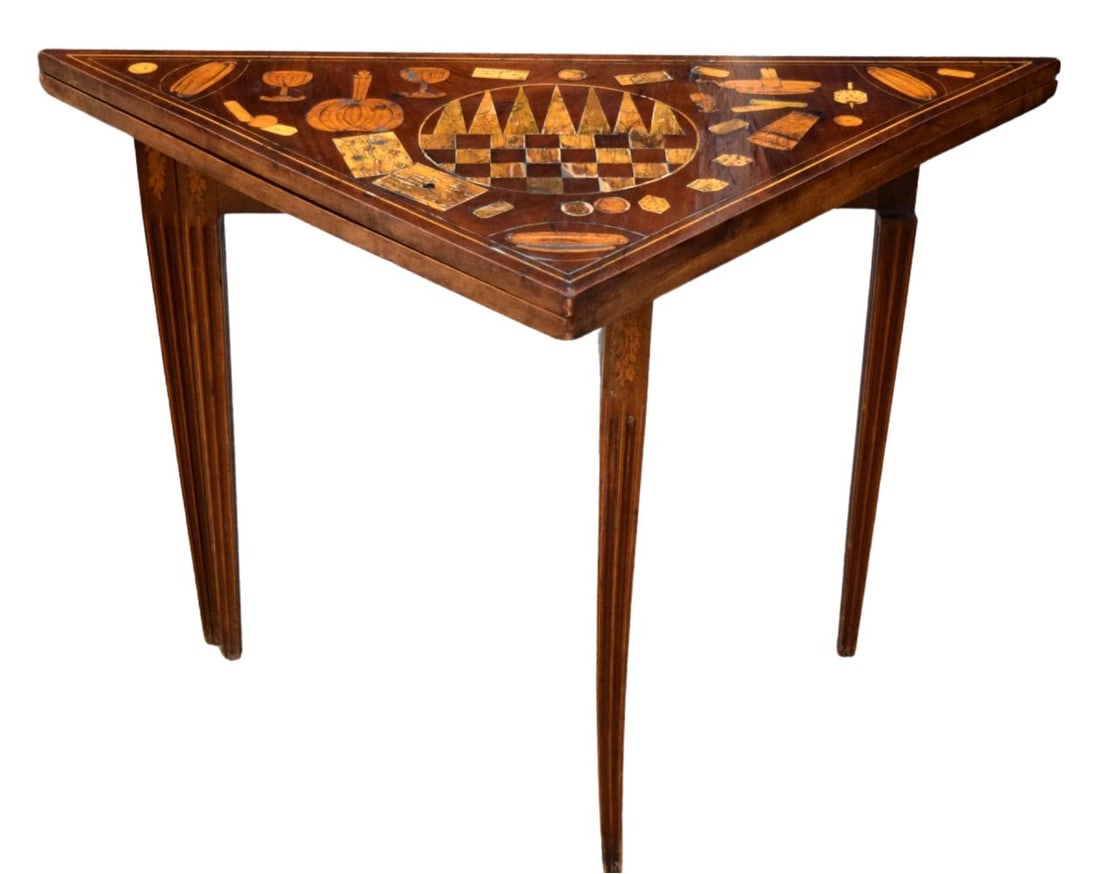 Exclusive 18th Century Triangular Folding Inlaid Game Table: 18th century Dutch marquetry card/game table, profusely inlaid throughout, the top swivels and folds over to reveal a playing surface along with further inlays depicting playing cards, dice, game