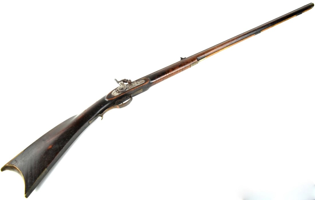 Pennsylvania Long Rifle c.1830's: Pennsylvania long rifle with very fine incised carved stock. Maker's mark. c. 1830's . Total length: 55 3/8". For additional images please visit sofedesignauctions.com Detailed co