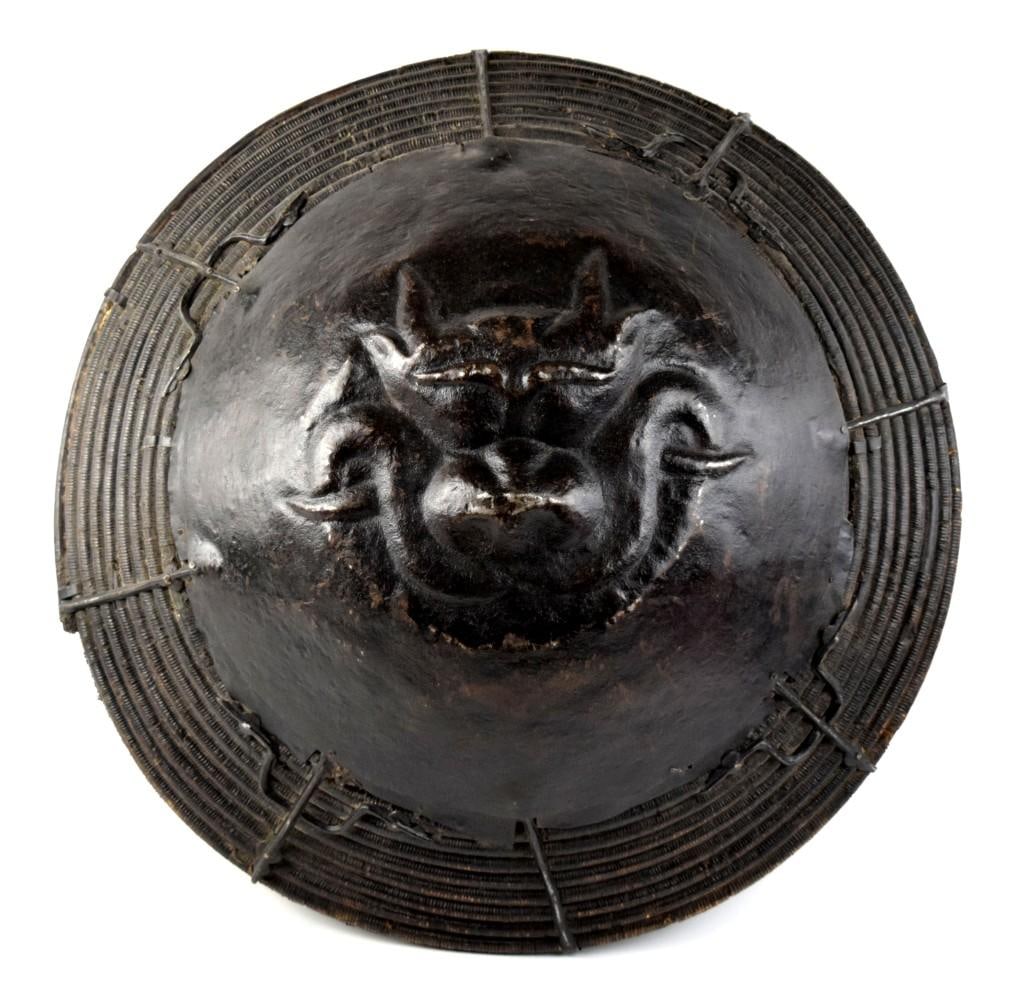 Antique Iron And Willow Chinese Shield Large And Unusual: Antique Iron And Willow Chinese Shield Large And Unusual. A large and rarely seen woven willow and iron antique Chinese shield with central image of a very well defined and artfully wrought dragon fac