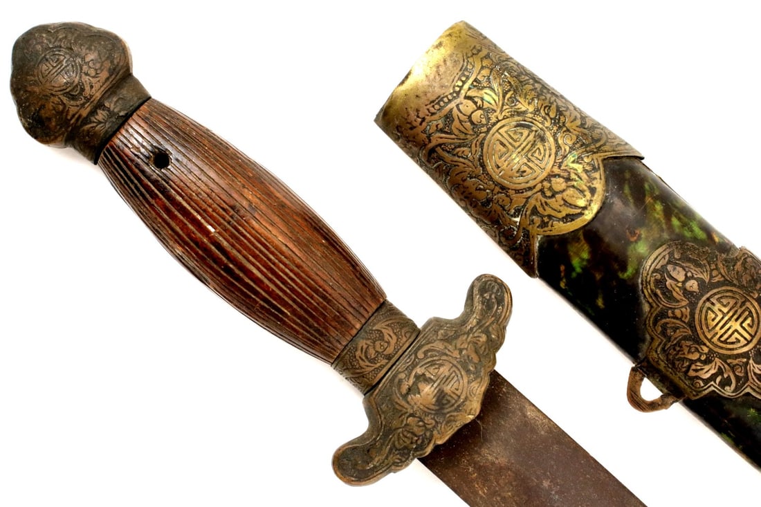 CHINESE 19TH C. TO BOXER REBELLION ERA WARRIOR'S JIAN SWORD WITH ENGRAVED BRASS MOUNTS: CHINESE 19TH C. TO BOXER REBELLION ERA WARRIOR'S JIAN SWORD WITH ENGRAVED BRASS MOUNTS. Total length (inside scabbard if present) : 21 3/4", Blade length : 15 3/4".~ For additional images please visit