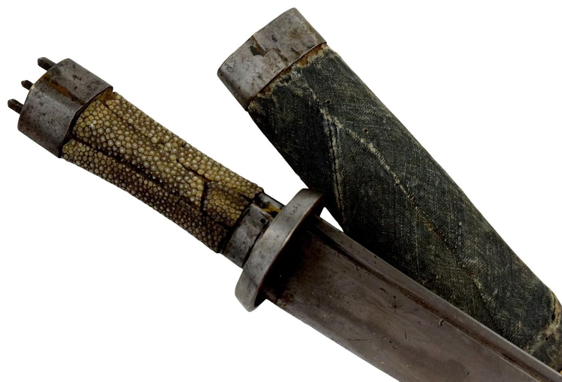 RARE 18th - 19th C. TIBETAN SHORT SWORD WITH ORIGINAL SCABBARD: RARE 18th - 19th C. TIBETAN SHORT SWORD WITH ORIGINAL SCABBARD. Tibet, 18th - 19th century. An unusual antique Tibetan short sword or sidearm retaining its original scabbard. The weapon features a str