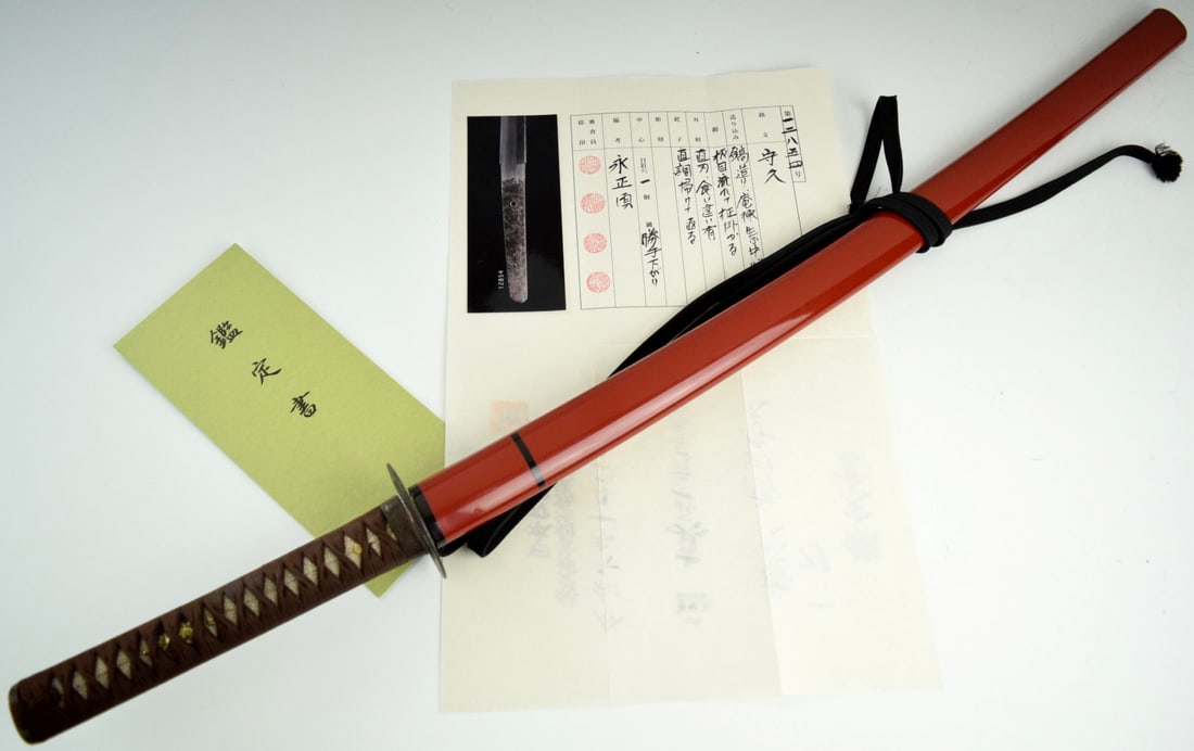 Early 1500 Koto katana, 27 and 1/2 inch length of cutting edge, exceptional condition blade and: Koto katana, 27 and 1/2 inch length of cutting edge, exceptional condition blade and mounts.A rare signed Koto. The tang is signed Morihisa in a nice, well-chiseled script and is ubu, orun-shortened. 