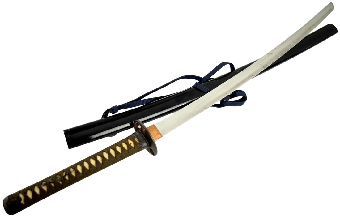 Shinshinto katana, mumei o-suriage, ca. 1800's.: Shinshinto katana, mumei o-suriage, ca. 1800's. The 26 inch blade shows an itame hada with Mino inspired gunome hamon. The blade is mounted samurai style mounts with high quality iron sukashi tsuba an