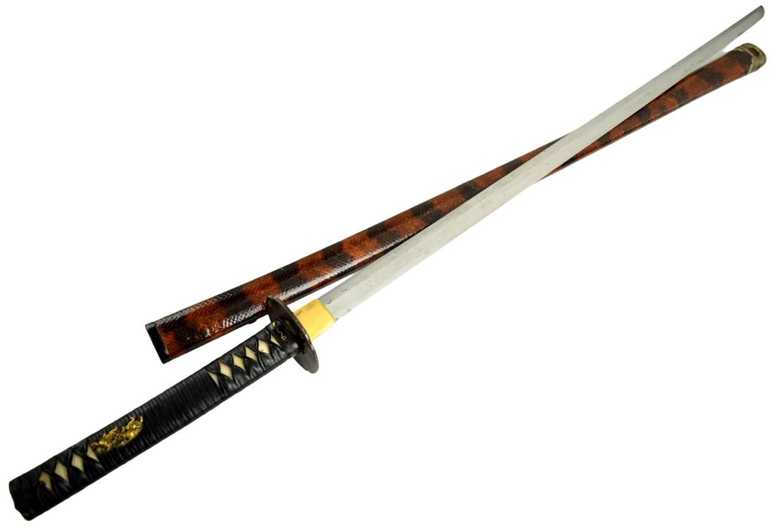 Shinto katana, 30 and 1/2 inch length of cutting edge, exceptional condition blade and mounts.: Shinto katana, 30 and 1/2 inch length of cutting edge, exceptional condition blade and mounts. Signed Heianjo Fujiwara Nobuyoshi. The blade shows a well-grained itame hada and a complex hamon that ble