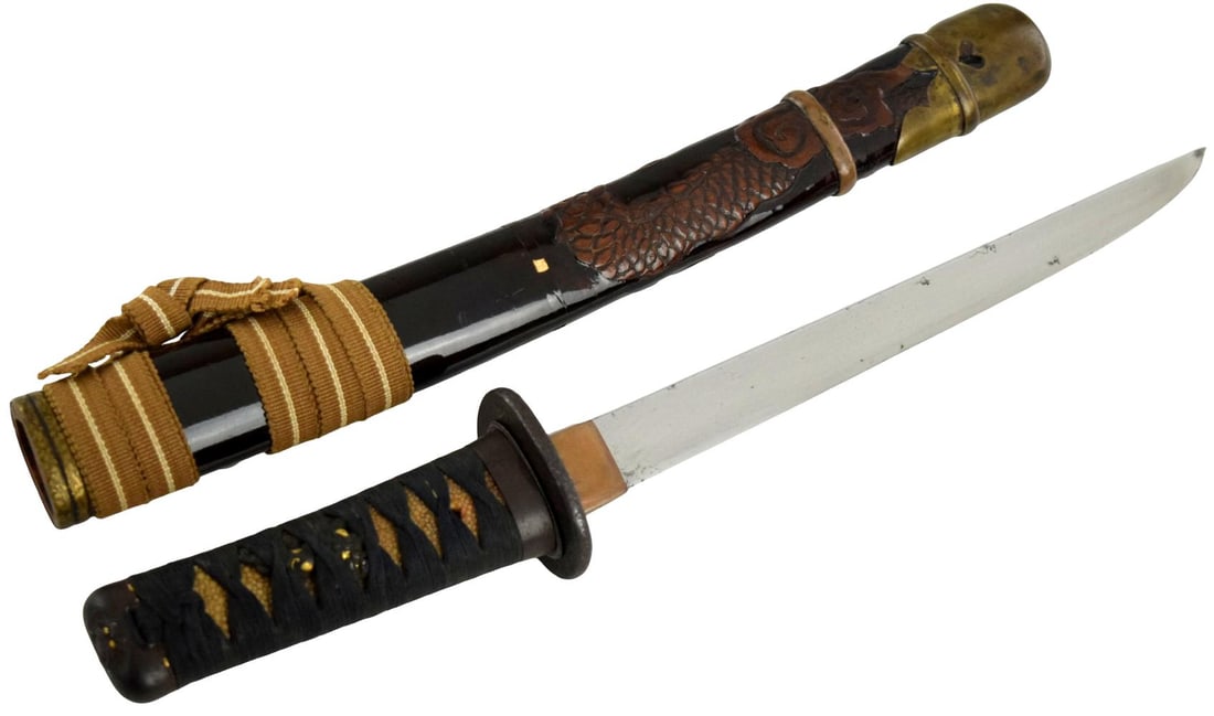 Koto tanto, 8 and 1/2 inch length of cutting edge, unsigned yoroi doshi armor piecer, ca. 1500's.: Koto tanto, 8 and 1/2 inch length of cutting edge, unsigned yoroi doshi armor piecer, ca. 1500's. The blade with a ridgeless hira-zukuri construction and showing a very thick kasane indicating the bla