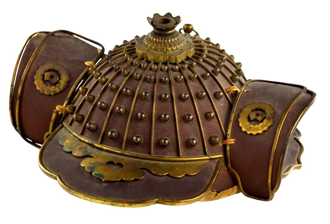 Japanese Samurai Kabuto Helmet, Late Edo Period, 19th Century: Antique Japanese samurai helmet, or kabuto, dating to the 19th century, late Edo period. Constructed with a rounded iron bowl fitted with numerous vertical ribs and rows of raised rivets, surmounted b