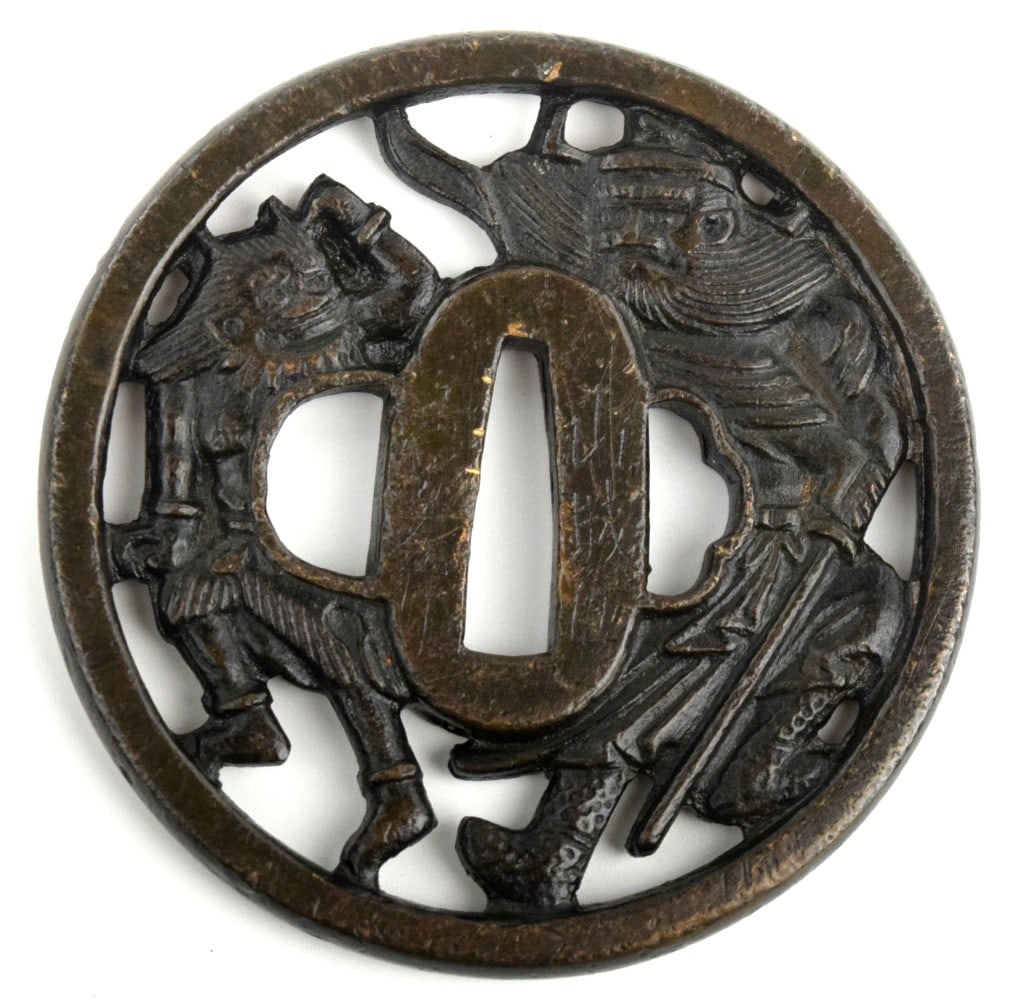 Antique Japanese TSUBA, a Samurai Sword / Dagger Guard: Antique Japanese TSUBA, a Samurai Sword / Dagger Guard. Size: 3" D. For additional images please visit sofedesignauctions.com Detailed condition reports are not included in this c