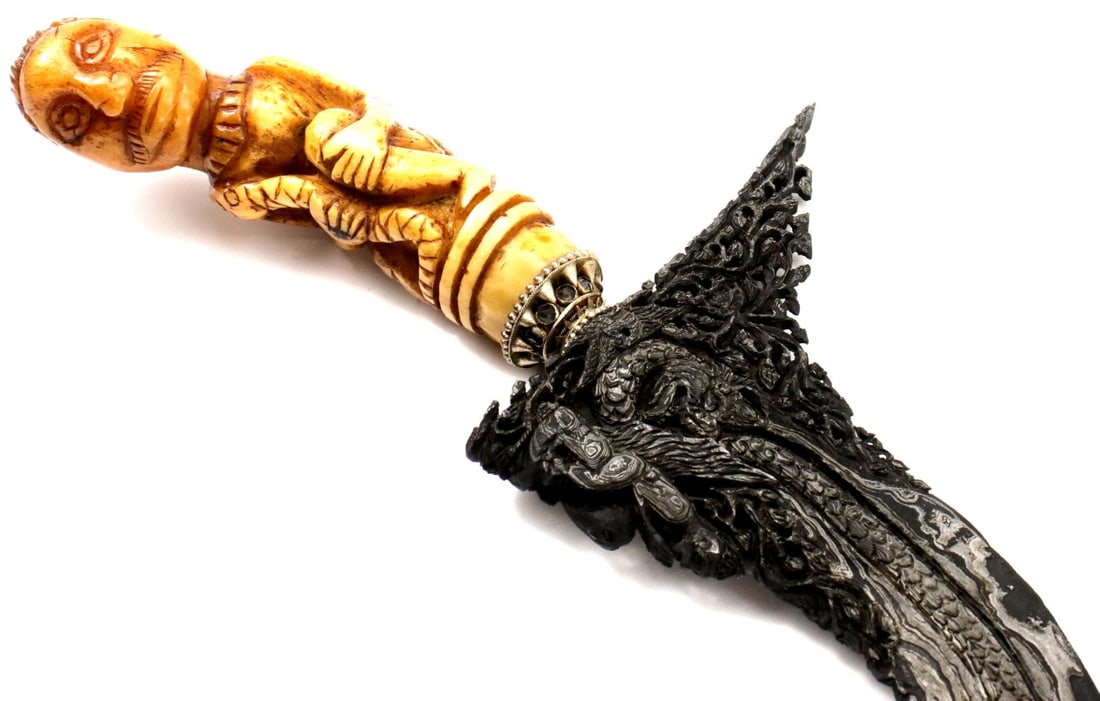 Rare Antique Indonesian KERIS Dagger with Fine Carved Bone Grip & Exquisite Carved Damascus Steel: Rare Antique Indonesian KERIS Dagger with Fine Carved Bone Grip & Exquisite Carved Damascus Steel Blade. Total length: 18 1/4", Blade length: 15 1/4". For additional images please visit sofed