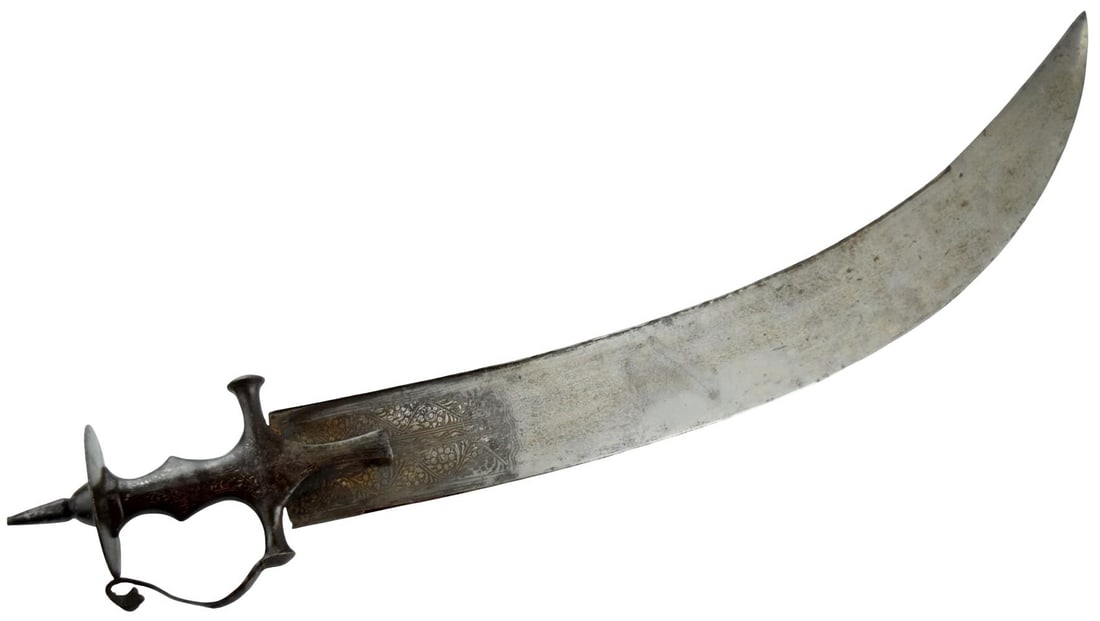 19th Century Indian Tegha Executionerâ??s Sword: A large and imposing 19th-century Indian tegha, or heavy cutting sword, traditionally associated with execution and ceremonial use. The weapon features a very broad, strongly curved single-edged steel