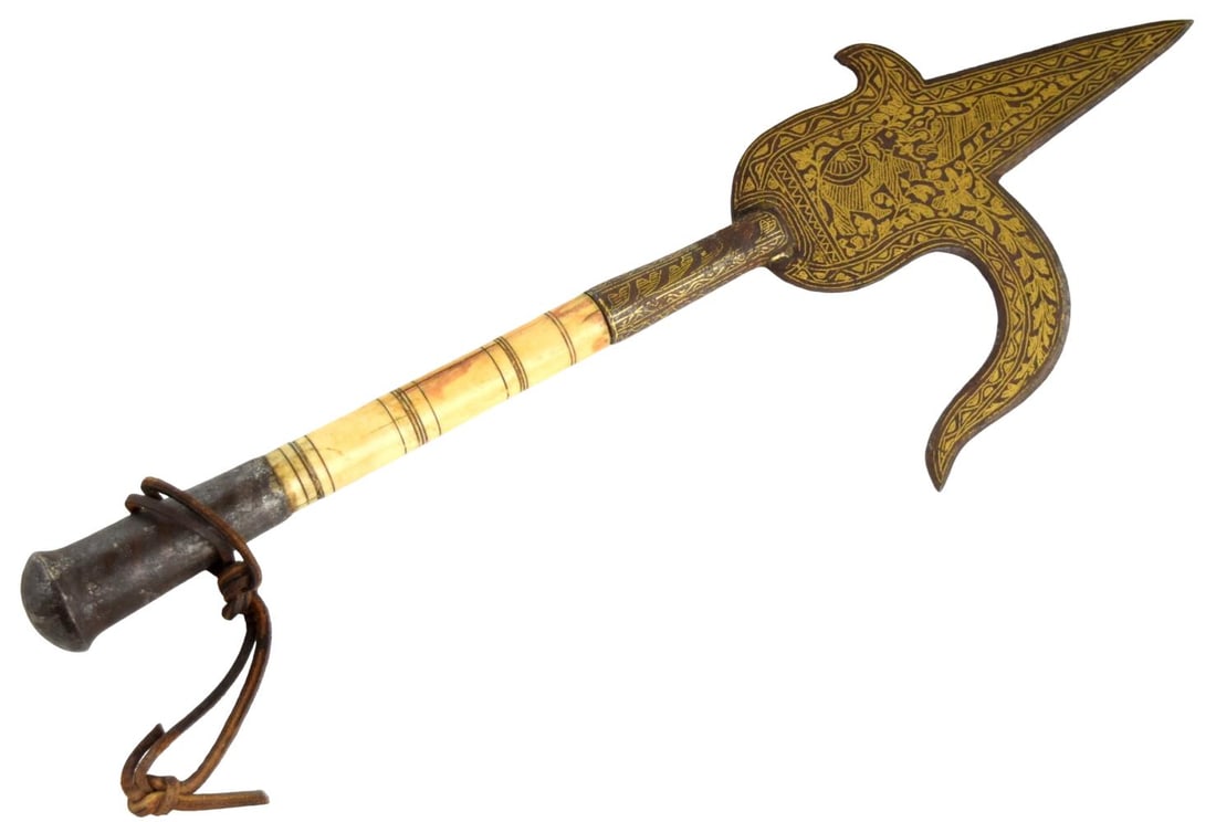 Ornate 19th Century Indian Ankus Elephant Goad with Gilded Decoration: A finely decorated 19th-century Indian ankus, or elephant goad, of ceremonial quality. The iron head is formed with a broad projecting point and a deeply curved hook, both extensively ornamented with 