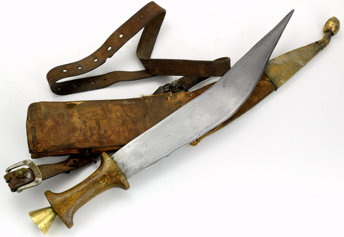 Early 20th C. Ethiopian (Horn of Africa) Danakil GILE Dagger: A classic form of Horn of Africa dagger called a gile, similar in form and derivedfrom the Arabian peninsular jambiya, the gile can be found in Ethiopia, Eritrea, Djibouti, andSomalia, where is known 