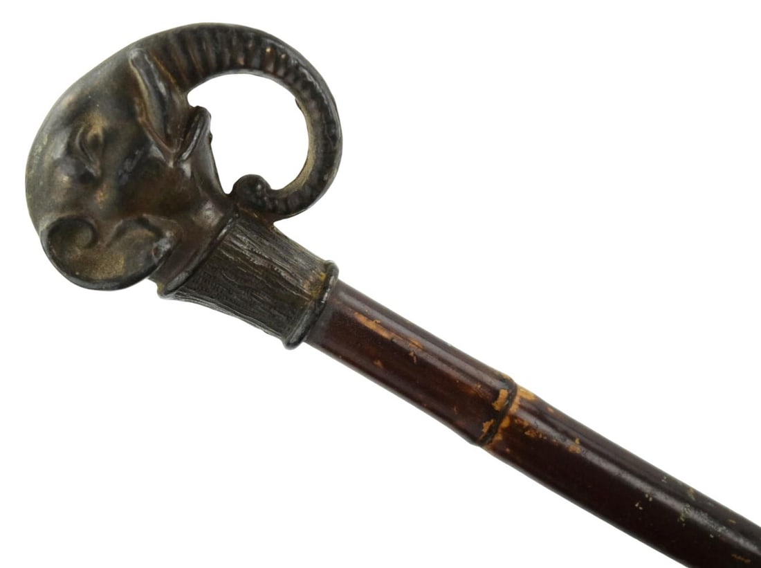 Bamboo Walking Stick With Elephant Head Handle: Japanese bamboo walking stick with elephant head handle. Total length: 31". For additional images please visit sofedesignauctions.com Detailed condition reports are not included