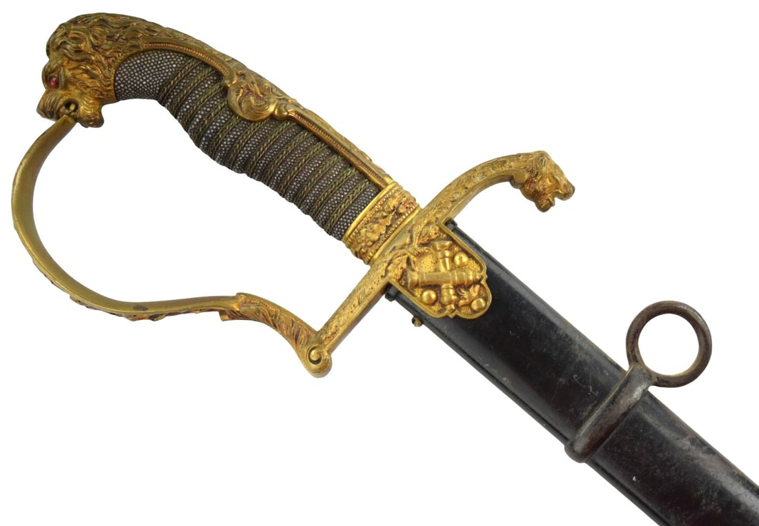 German Imperial Artillery Officers sword w/red lead glass crystal eyes: German Imperial Artillery Officers sword w/red lead glass crystal eyes. Total length (inside scabbard if present) : 38 1/2", Blade length : 32". ~ . For additional images please visit sofedes