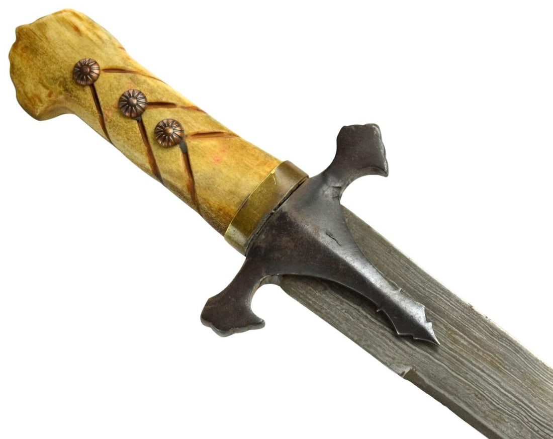Polish / Ottoman-Style Karabela Saber with Pattern-Welded Damascus Blade: Interesting composite saber of Karabela form, incorporating an apparently old, strongly curved single-edged blade displaying a pronounced layered or pattern-welded surface commonly referred to as Dama