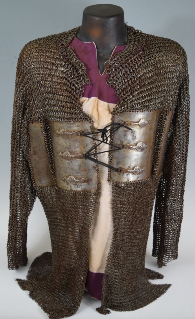 17th Century Indian Armor: 17th Century Indian Armor. Singed. Composed of rings each one interlaced with four other rings and each one individually riveted.