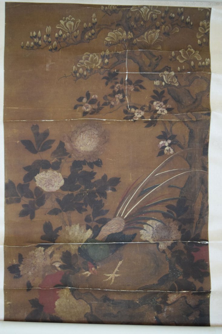 Ming Dynasty Color Painting in Silk of golden bird, mag: Ming Dynasty Color Painting in Silk of golden bird, magnolia, etc.. Dimensions: 31.25\" wide x 86\" length. Some damage.