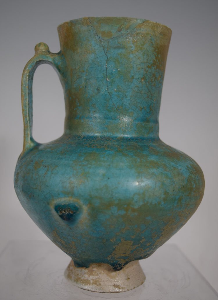 12th century Persian Islamic Gurgon Pitcher: 12th century Persian Islamic Gurgon Pitcher. Finely hand painted. Diameter from handle to handle- 5". 6.5" high. Provenance: Ex-collection of H. Medill Sarkisian (1909-1993), Denver, Colorado, then pa