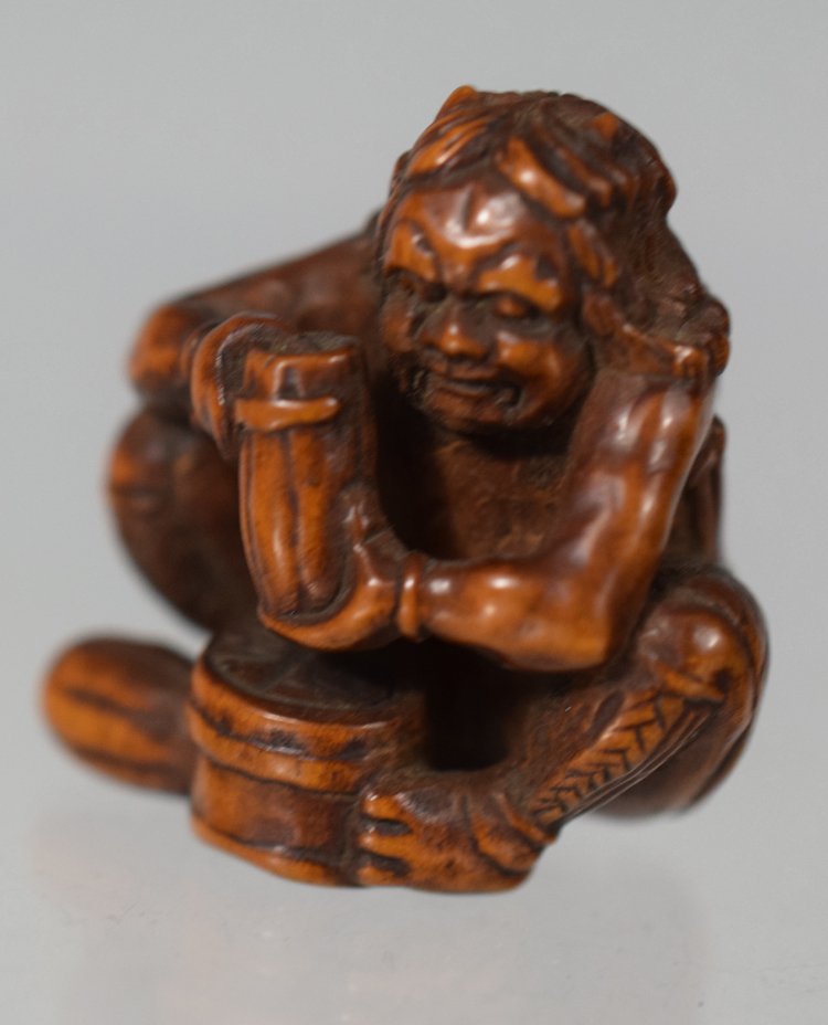 Antique Japanese Edo period wood carved Oni netsuke: Antique Japanese Edo period wood carved Oni netsuke. 29 mm high x 25 mm long x 22 mm wide.