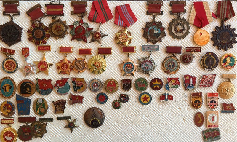 Collection of over 55 Asian Military Badge and Medals: Collection of over 55 Asian Military Badge and Medals. Including some Chinese and Vietnamese badges and medals. Part of large collection of Asian military of a private collector from Denver Colorado.