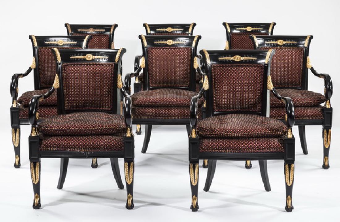 (8) Italian ebonized and parcel gilt armchairs: Set of eight Italian Empire style ebonized and parcel gilt armchairs, 20th century, each having a carved and gilded crest rail decorated with a central rosette and plumes, leading to scroll arms with