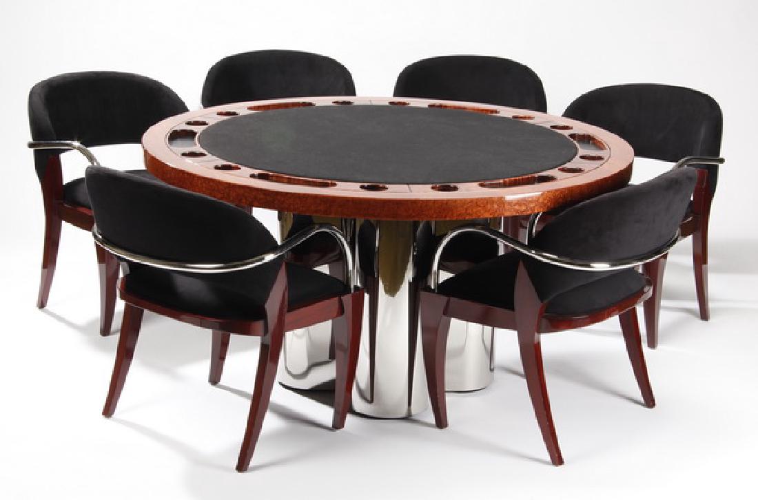 Brueton game table with six chairs: Contemporary laquered burl wood and stainless steel circular "Brueton Springfield Gardens No. 4" poker table inset with poker chip and drink holders, the playing surface upholstered in black felt, rai
