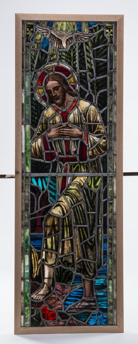 19th c. Continental stained glass of Jesus, 80"h: Continental stained and painted glass panel, 19th century, consisting of a central image of Jesus emerging from the River Jordan wearing a robe and sandals with his hands upon his chest, above him fli