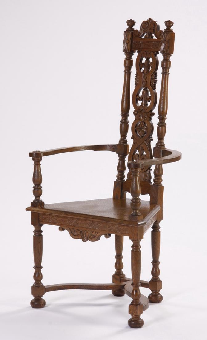 American carved oak armchair, early 20th c. (1 of 4)