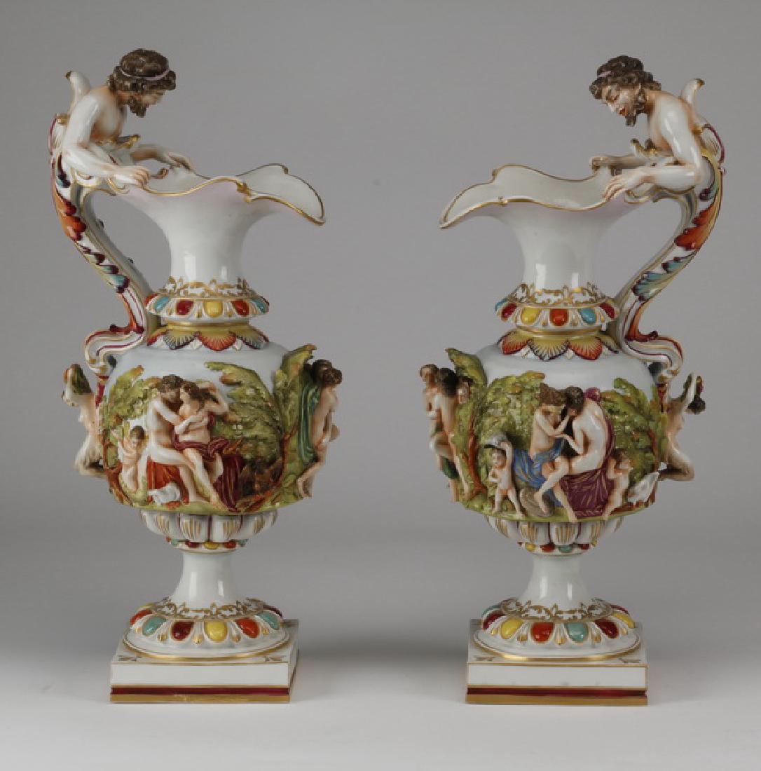(2) Italian Capodimonte style figural porcelain ewers