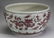 Chinese iron red dragon basin, Qianlong mark, 15"w.