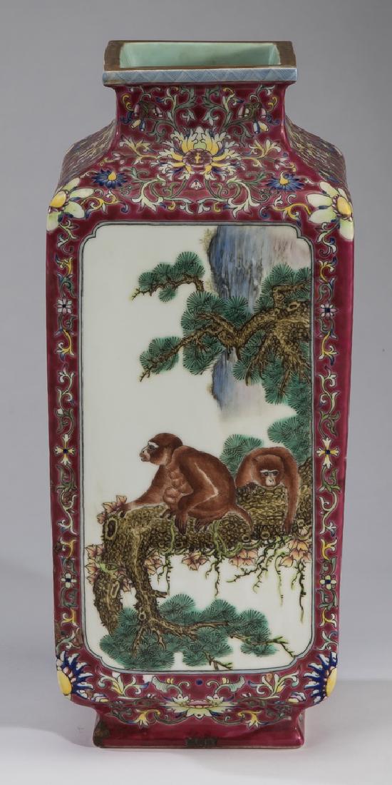 Chinese famille rose monkey cong vase, 15"h: Chinese famille rose cong vase, having a flattened square rim with blue hatch mark design above a square section body, each side having a reserve, one depicting a pair of monkeys in a pine tree with m