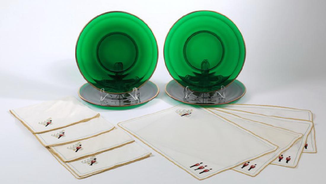 (12) pcs Holiday hand made chargers & linens: Holiday table accessories, comparing (4) Dalzell-Viking hand made emerald glass chargers with gilt rims, 10.5"dia, (4) linen napkins with embroidered Christmas trees, 19"l x 20"w; and (4) linen place