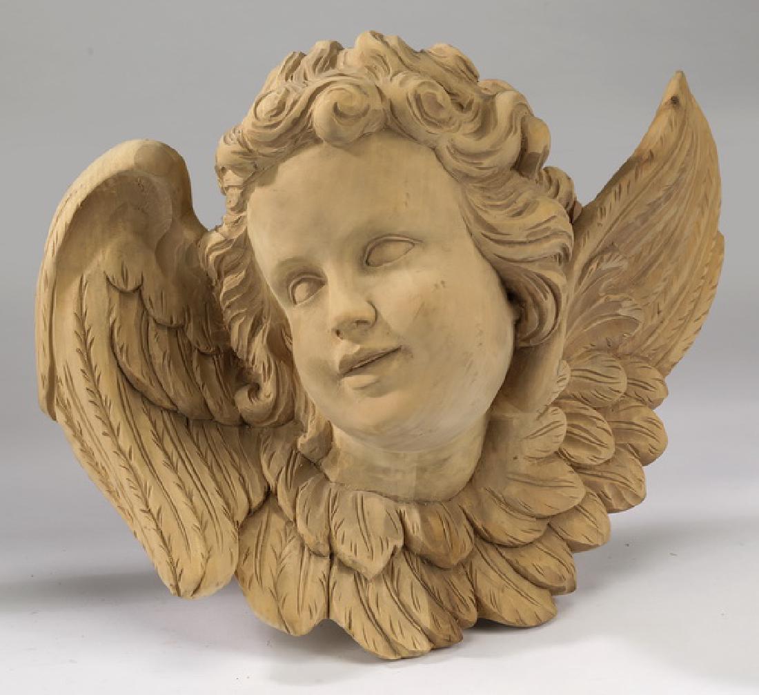 Unfinished Italian carved wood cherub mask (1 of 2)