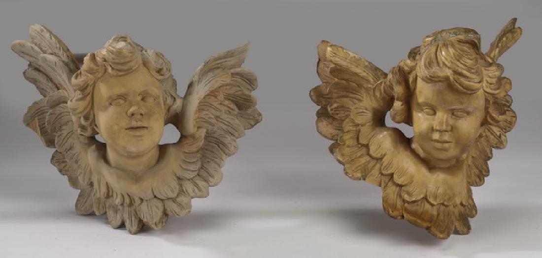 Two cherub masks: (1) carved wood (1) composition (1 of 2)