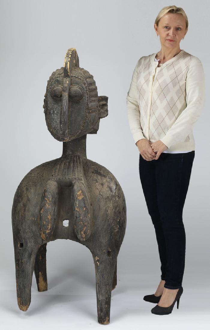 Carved wood shoulder mask of the goddess Nimba (1 of 5)